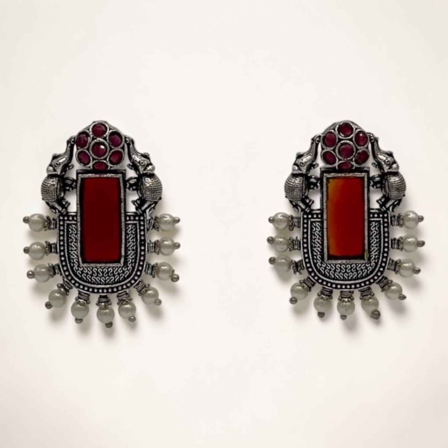 Regal Radiance Studs – Dark red